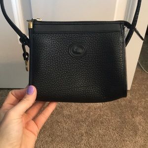 Dooney & Bourke over the shoulder black clutch